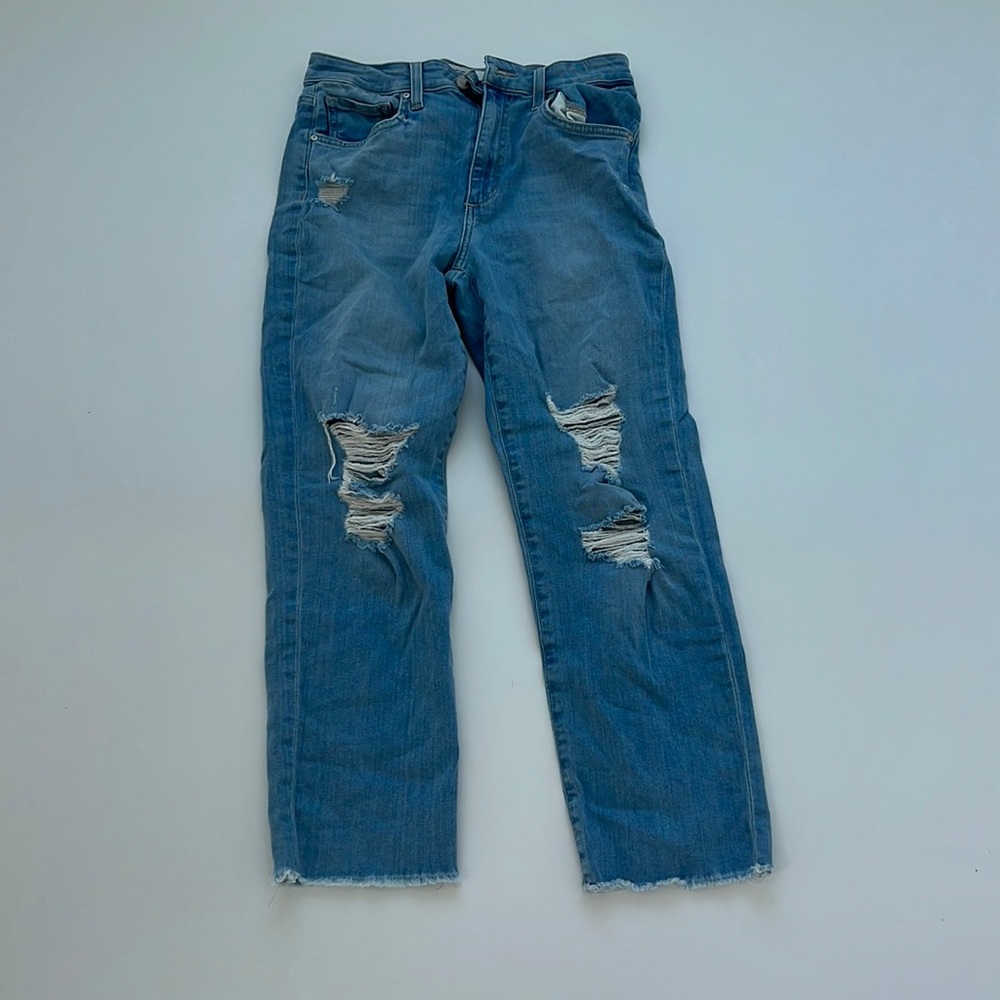Light blue torn jeans